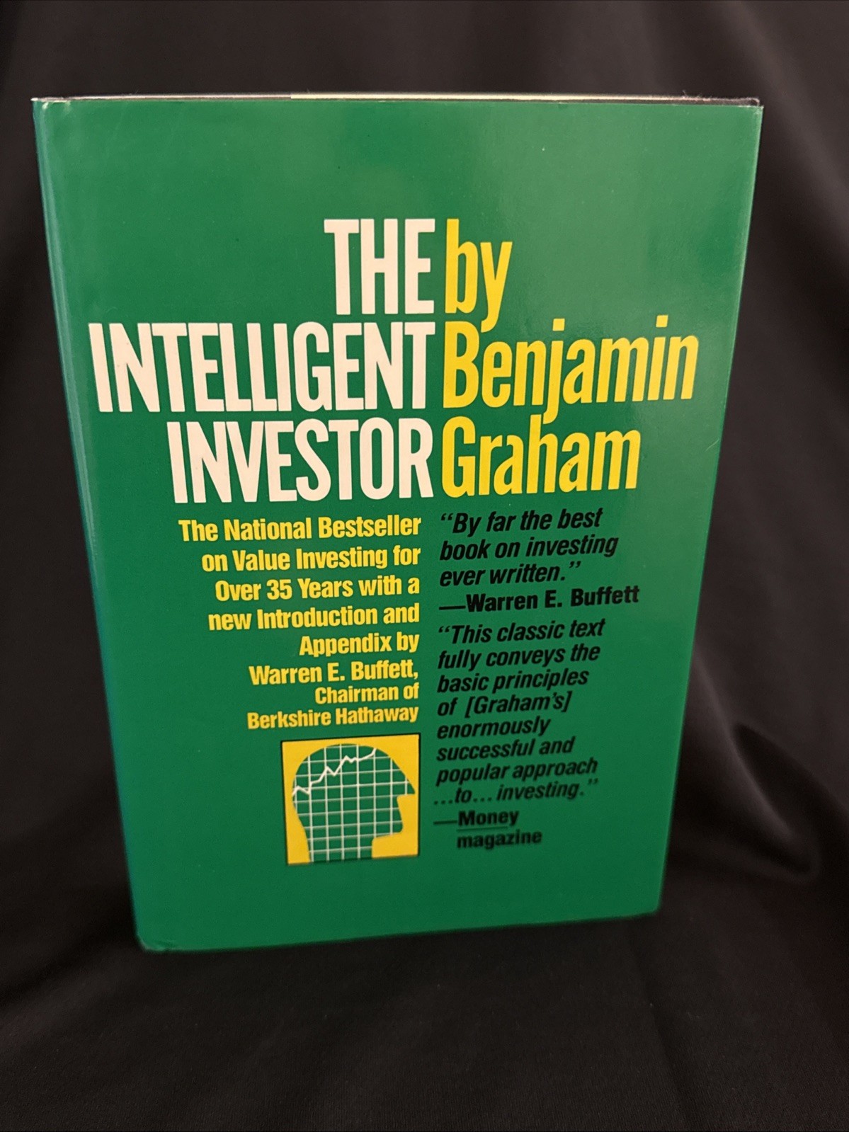 near mint – THE INTELLIGENT INVESTOR – Benjamin Graham HC DJ 4th Rev. Ed. 5th pr