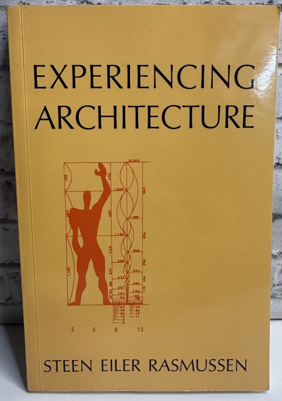 Experiencing Architecture Rasmussen, Steen Eiler paperback Used – Good