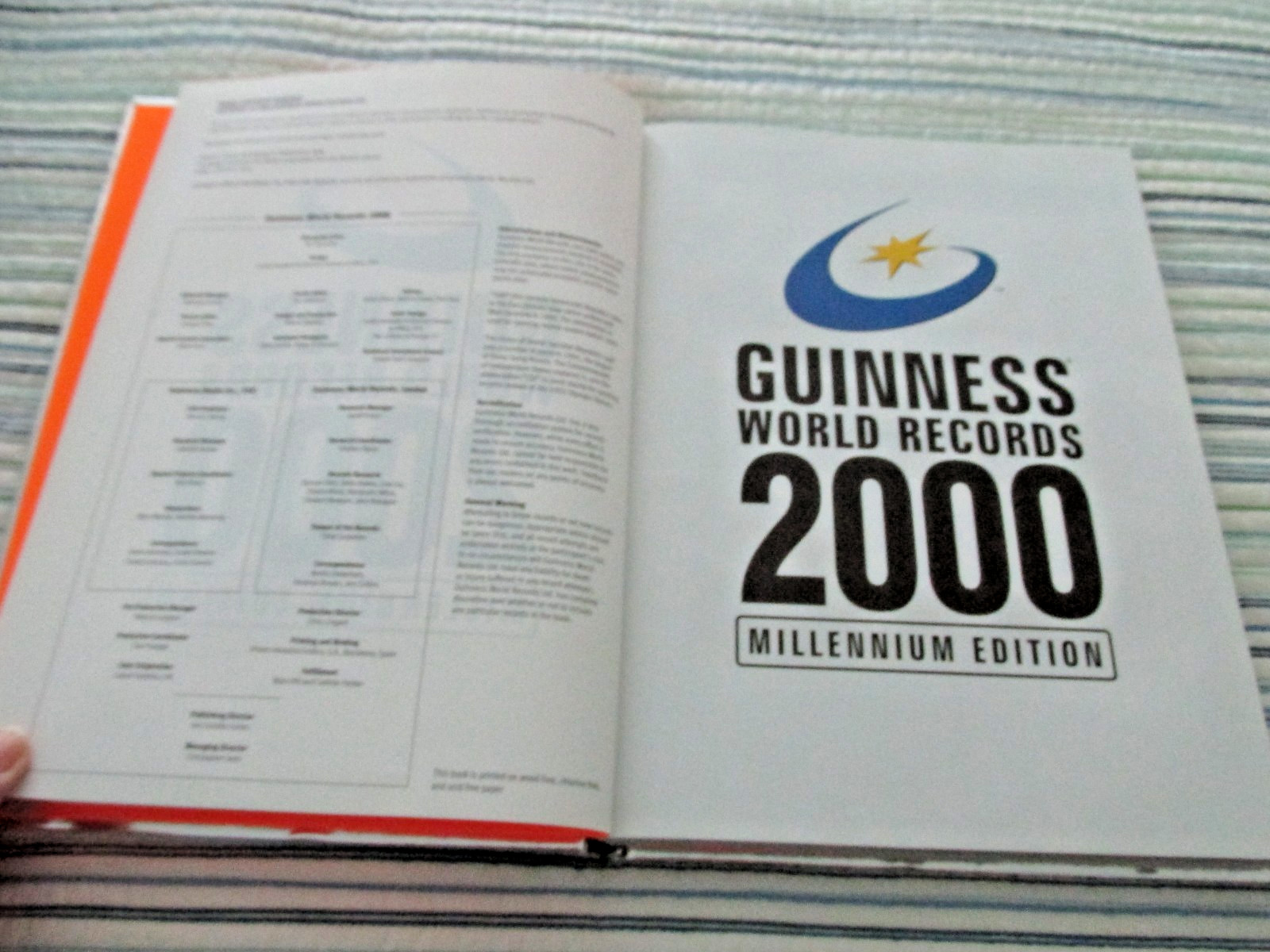Vintage Guinness Book Of World Records 2000 Millennium Edition Silver Hard Cover