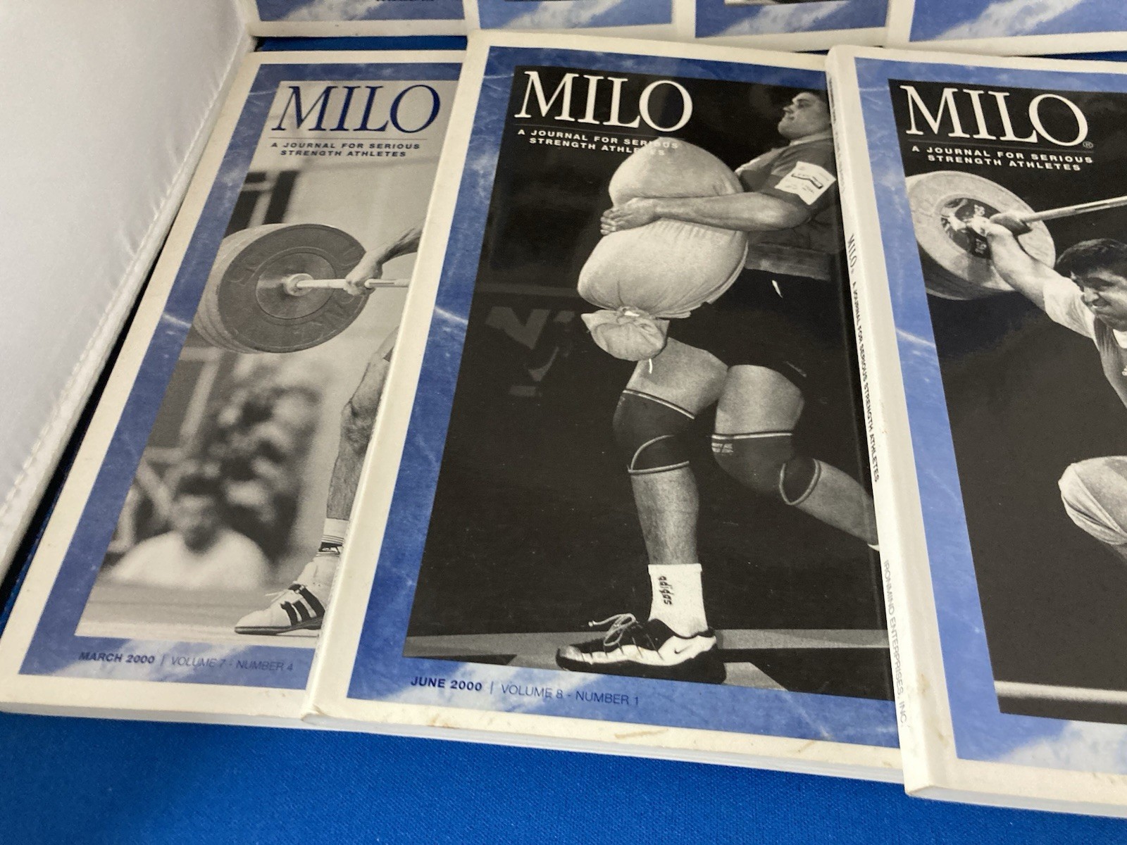 WEIGHTLIFTING-MILO JOURNALS FOR SERIOUS STRENGTH ATHLETES. LOT OF 7. 2000-2001
