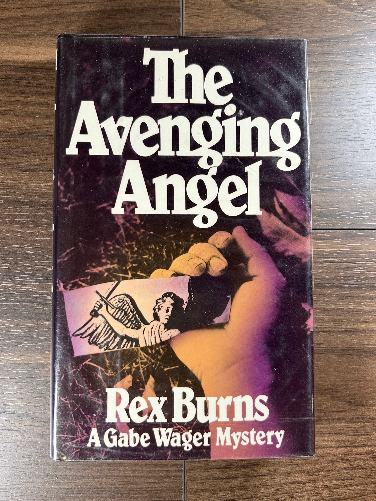 Burns THE AVENGING ANGEL 1st Edition 1983 Viking Press Gabe Wager Mystery DJ
